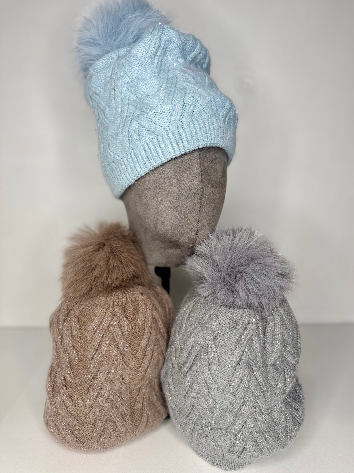 Sinead Muted Pastel Wool Blend Cable Knit Faux Fur Pom Pom Hat - Subtle Sequin Trim - Pastel Blue, Soft Grey, Soft Taupe