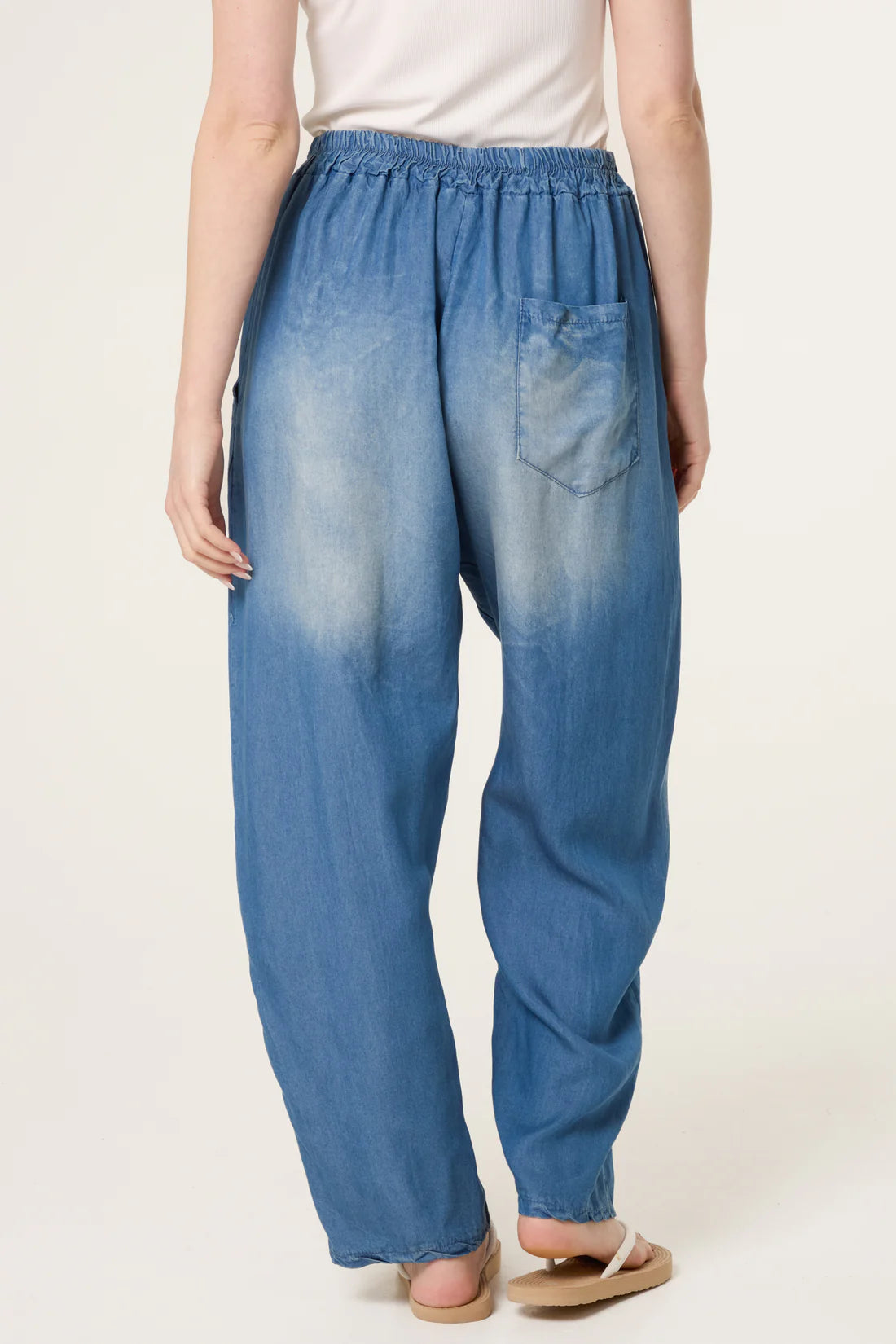 Carole Distressed Faded Denim Tencel Barrel Leg Trousers