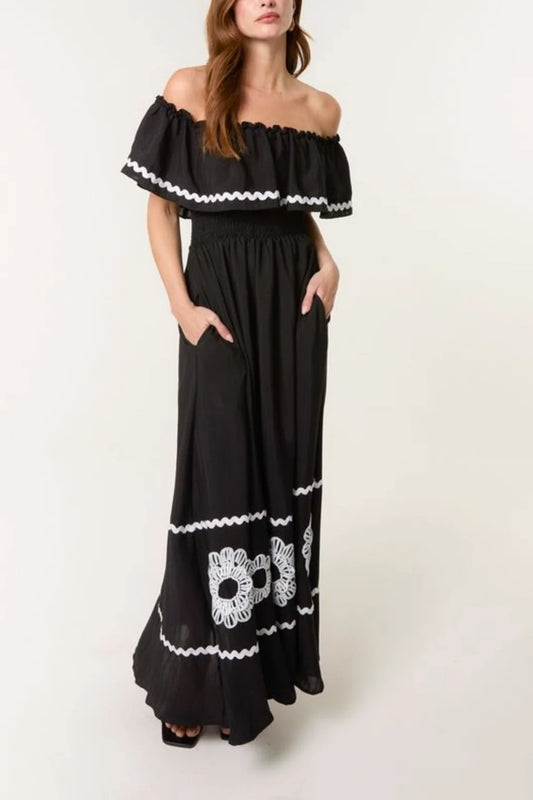 Maria Bardot Neckline Shirred Bodice Black Maxi Dress With White Embroidery & Rik Rak