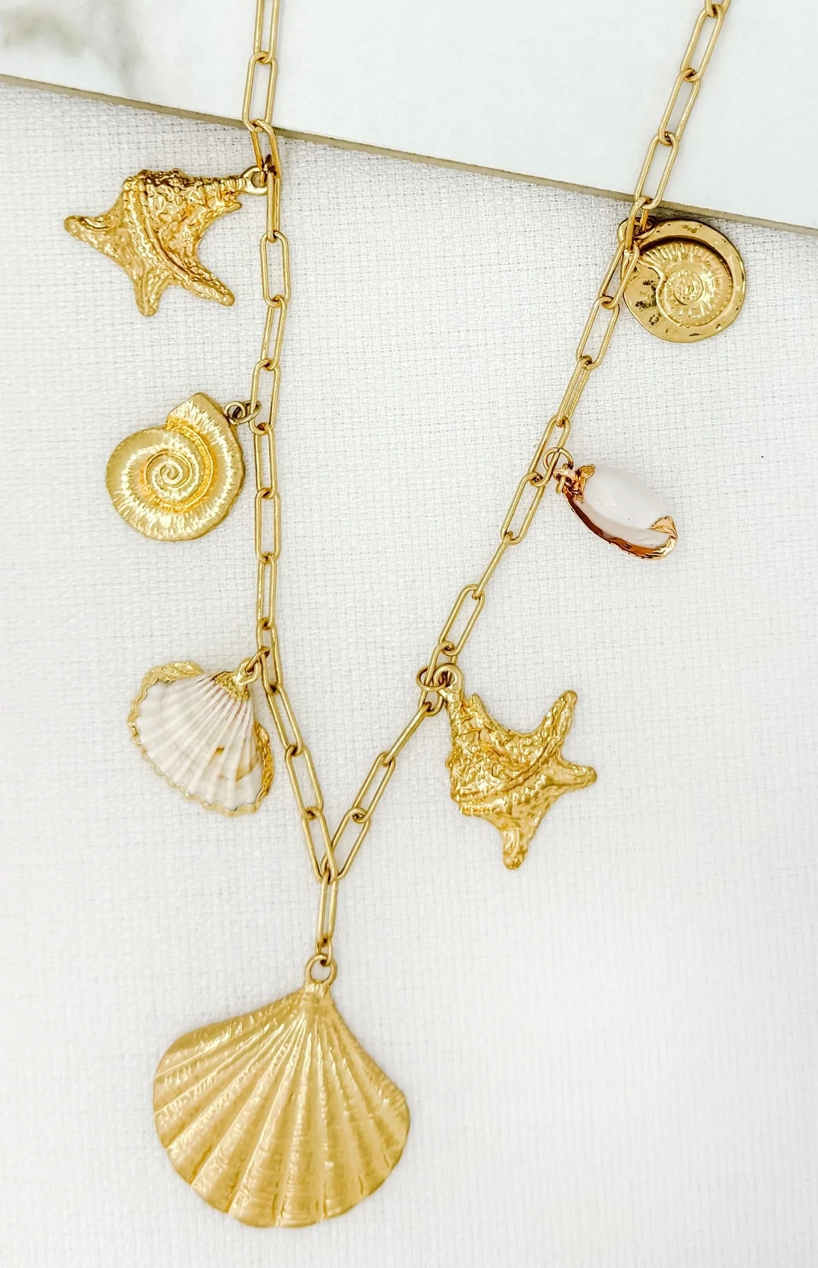 Envy Jewellery Long Gold Toned Charm Necklace With Chunky Gold & Real Shell Charms